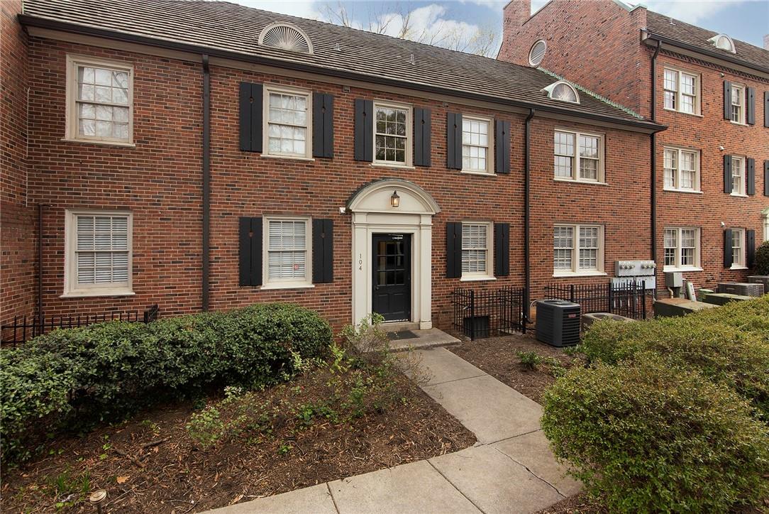 104 Colville Road, Unit 41A Charlotte, NC 28207 - Photo 20 of 21 a front view of a house with garden