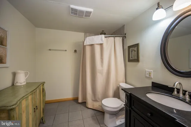 a view of a house with a big yard