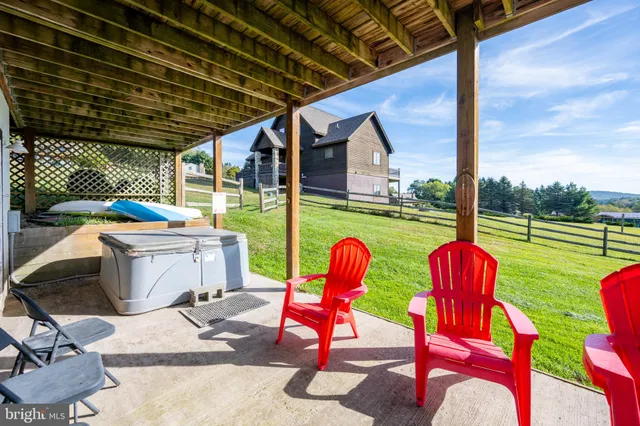 a view of a lake with a yard and outdoor space