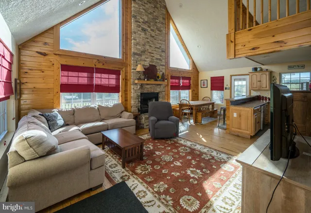 a view of a kitchen with dining area