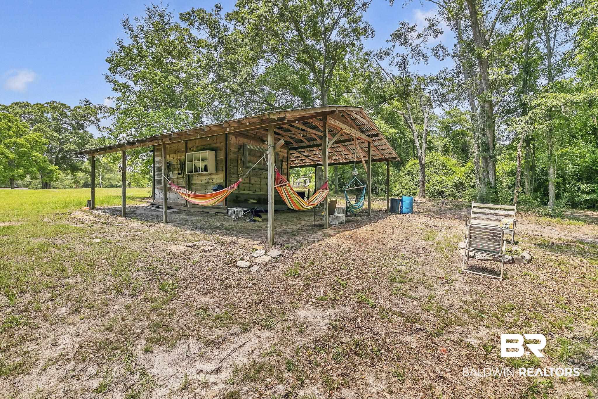 18626-1 Moore Road Andalusia, AL 36420 - Photo 7 of 17 View of yard featuring a carport