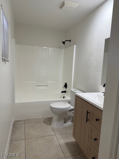 3906 13th Street West Lehigh Acres, FL 33971 - Photo 17 of 26 a bathroom with a toilet a sink and bathtub