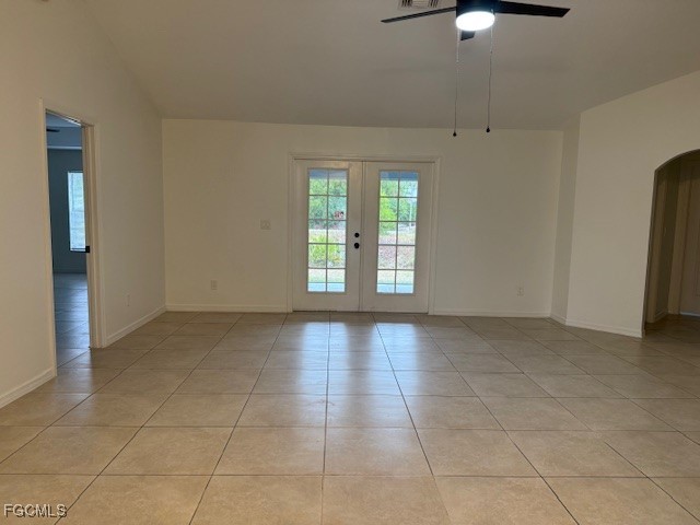 3906 13th Street West Lehigh Acres, FL 33971 - Photo 3 of 26 an empty room with windows