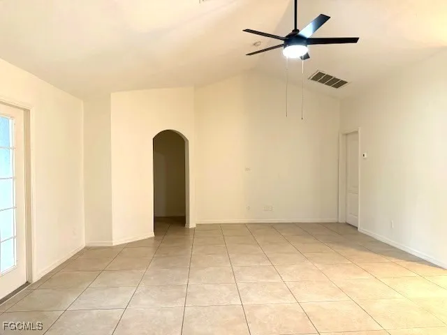 a view of a room with garage and tiles
