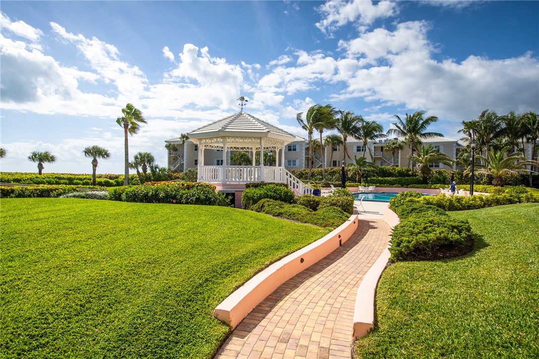 1050 Reef Road, Unit 102 Vero Beach, FL 32963 - Photo 25 of 36 a view of a house with a big yard