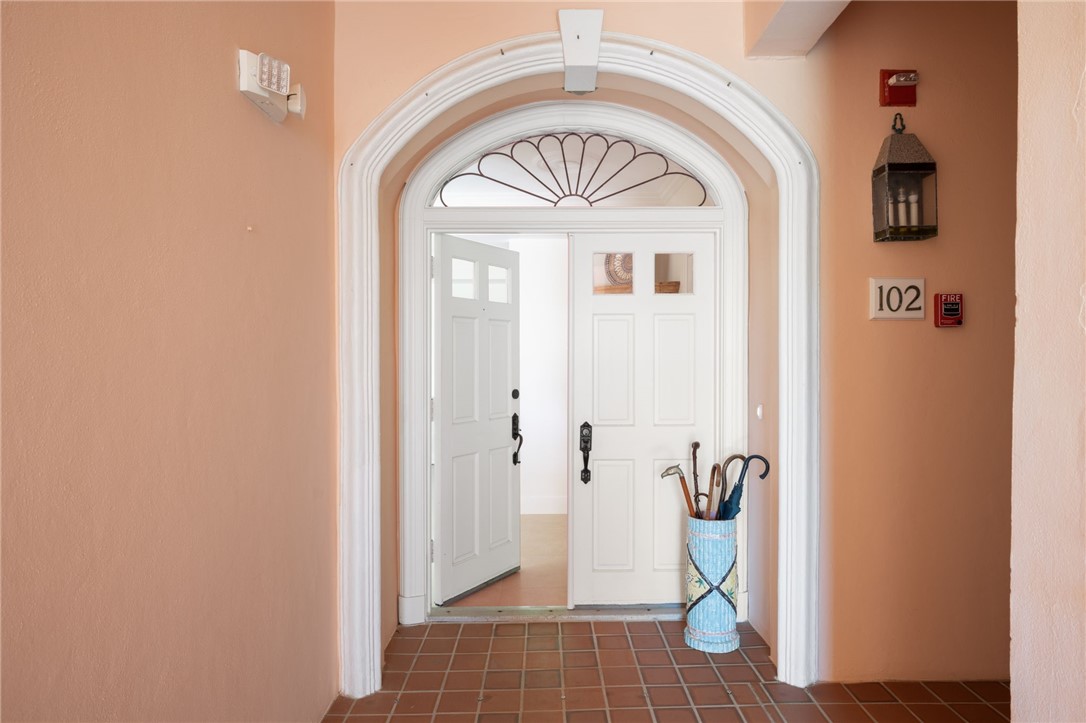 1050 Reef Road, Unit 102 Vero Beach, FL 32963 - Photo 3 of 36 a view of entryway with wooden floor
