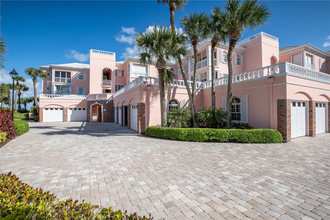 1050 Reef Road, Unit 102 Vero Beach, FL 32963 - Photo 32 of 36 a view of multiple houses with a yard