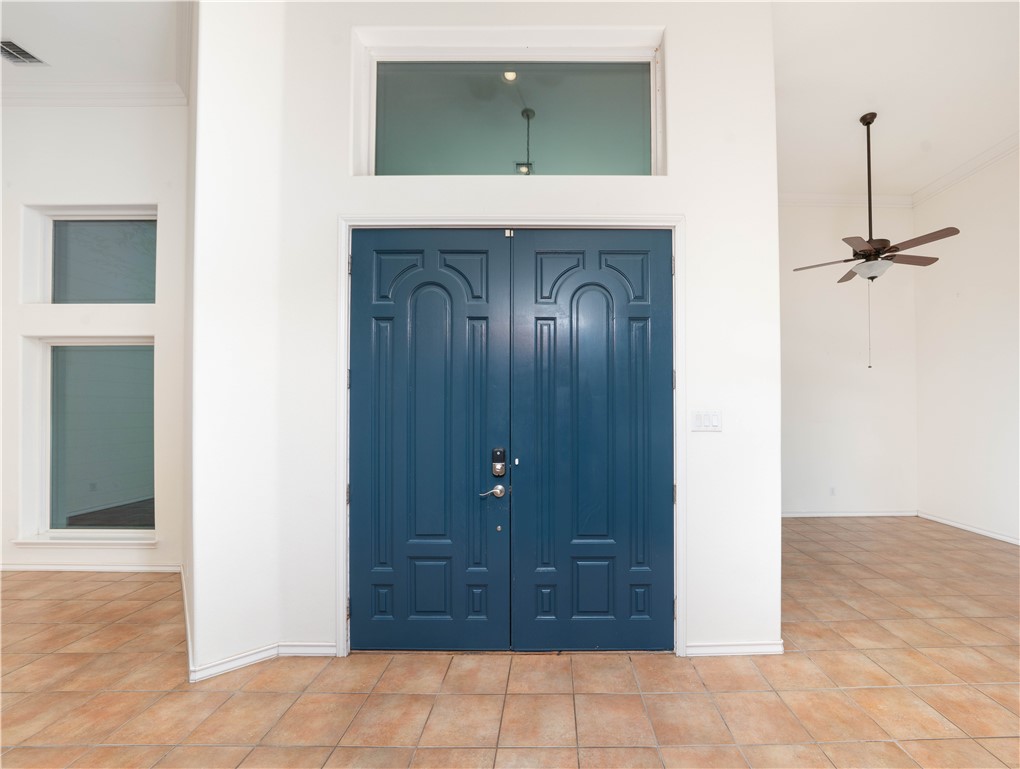 1034 Graham Road Corpus Christi, TX 78418 - Photo 4 of 40 Back to the the courtyard, dining on one side, sit