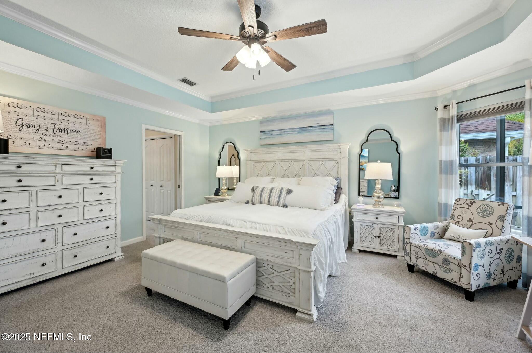 1732 Margarets Walk Road Fleming Island, FL 32003 - Photo 22 of 55 a bedroom with bed and window