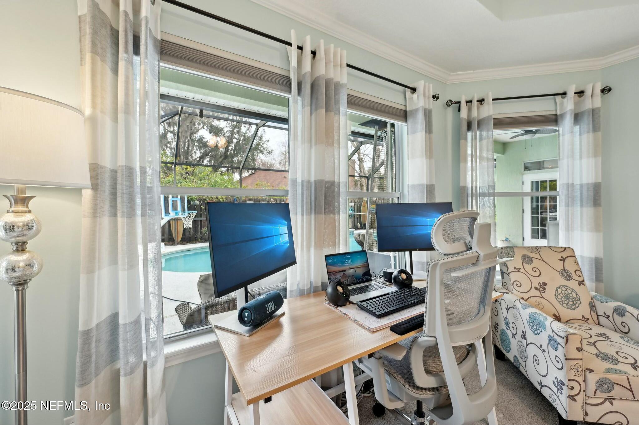 1732 Margarets Walk Road Fleming Island, FL 32003 - Photo 24 of 55 a workspace with furniture and a window