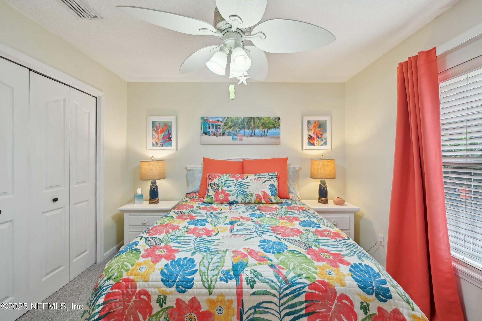 1732 Margarets Walk Road Fleming Island, FL 32003 - Photo 29 of 55 a bedroom with bed and wooden floor