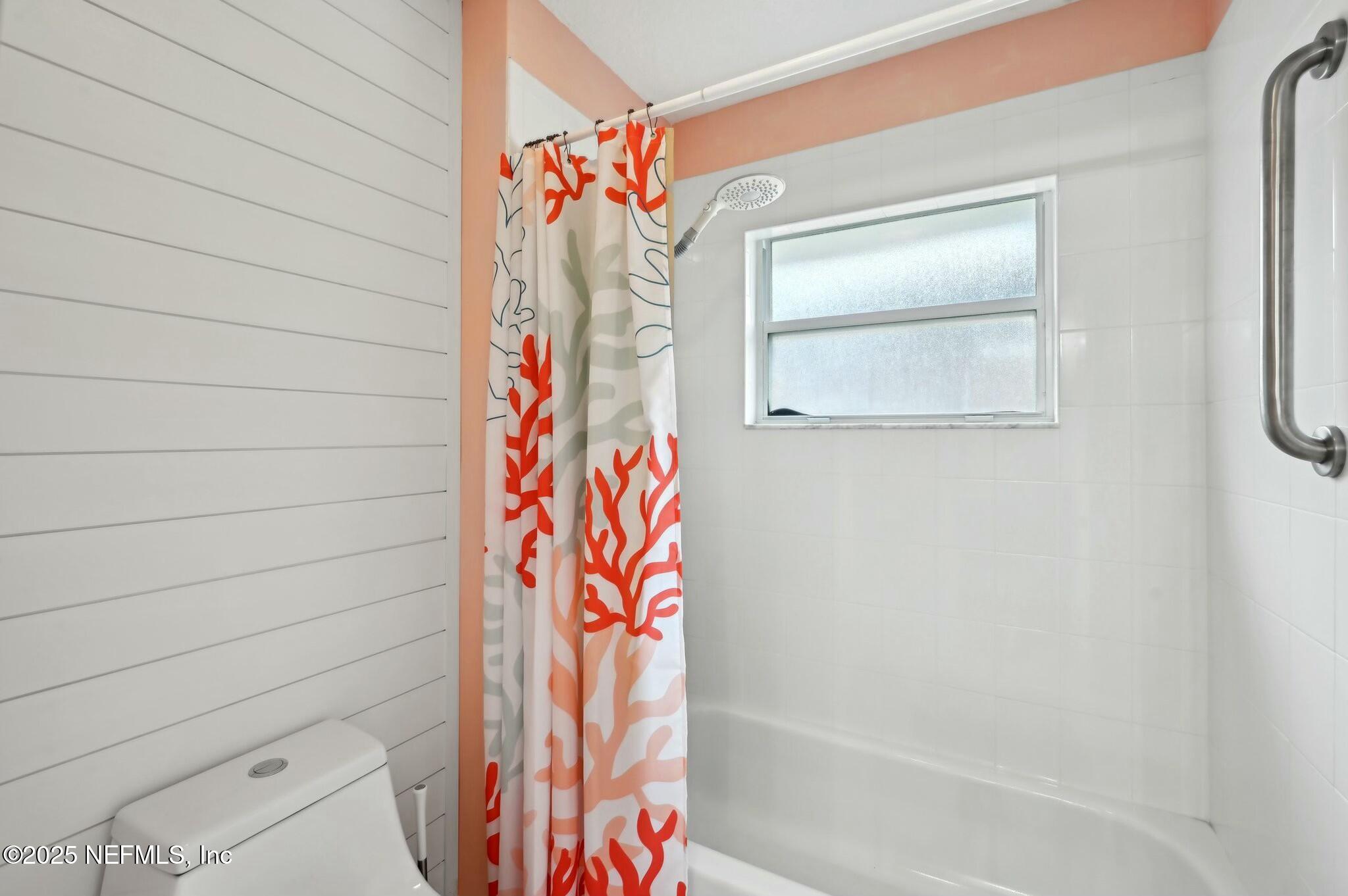 1732 Margarets Walk Road Fleming Island, FL 32003 - Photo 33 of 55 a bathroom with a bathtub and shower