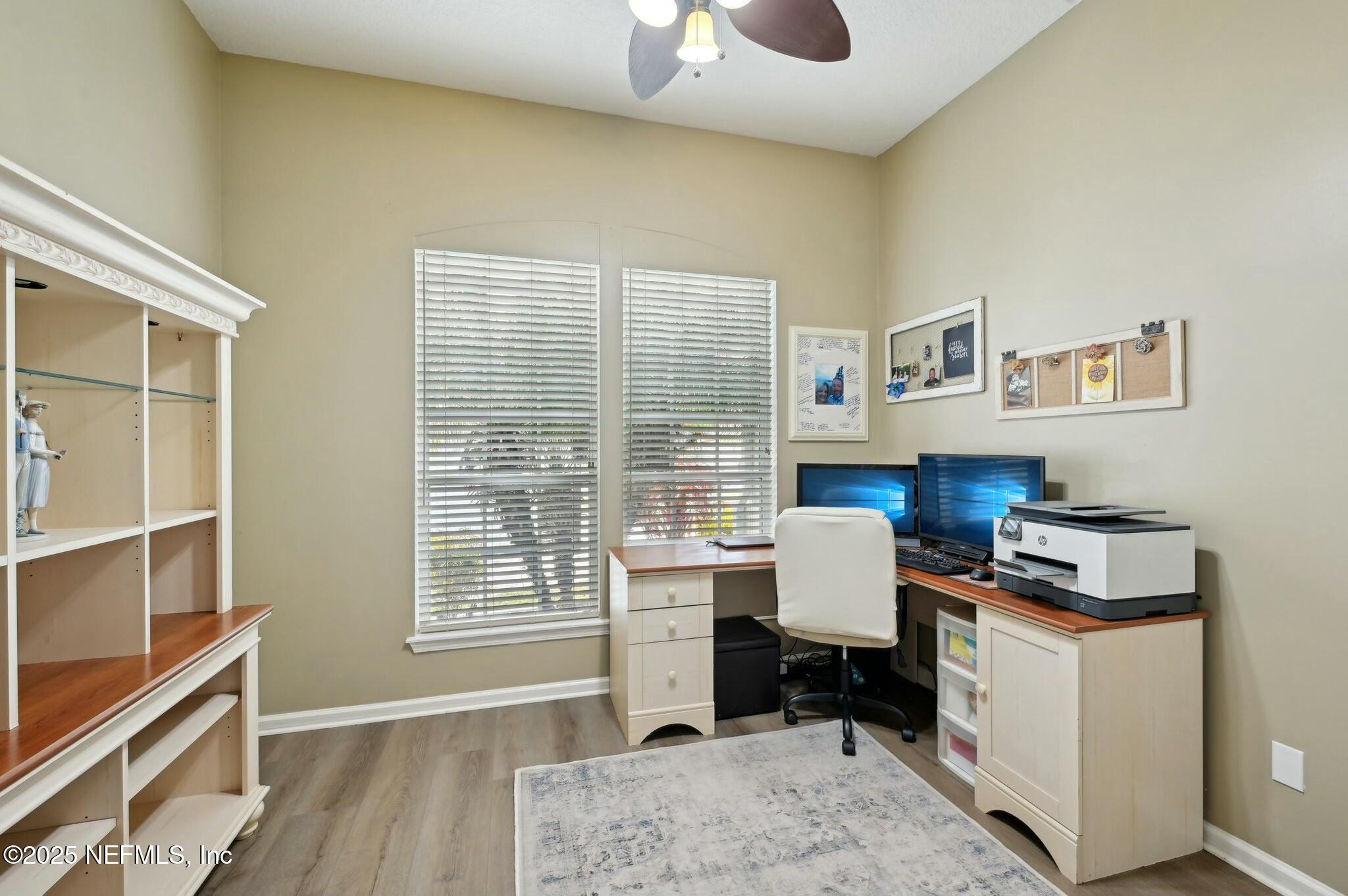 1732 Margarets Walk Road Fleming Island, FL 32003 - Photo 37 of 55 a workspace with furniture and a window