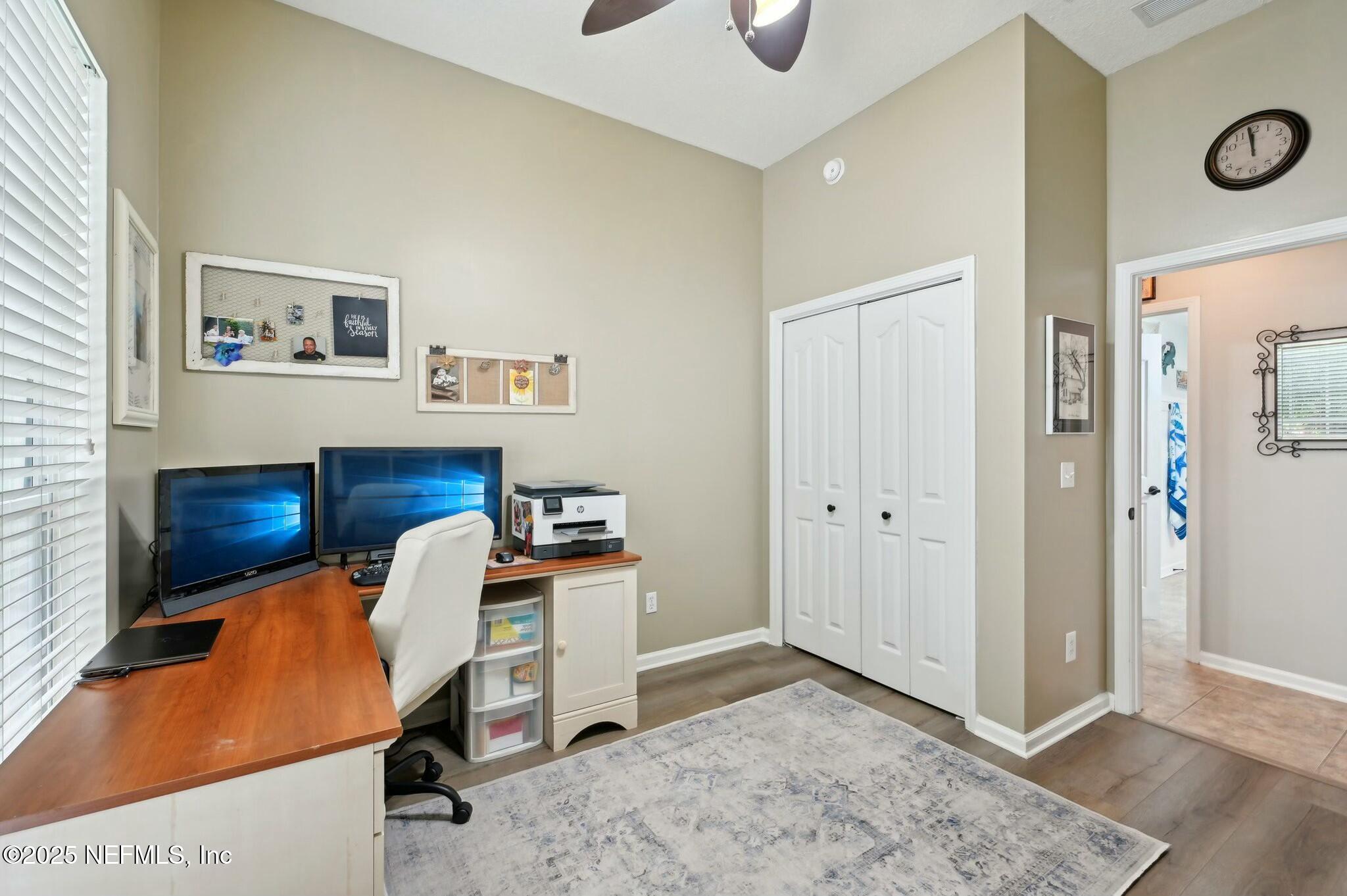 1732 Margarets Walk Road Fleming Island, FL 32003 - Photo 38 of 55 a room with furniture and a wooden floor