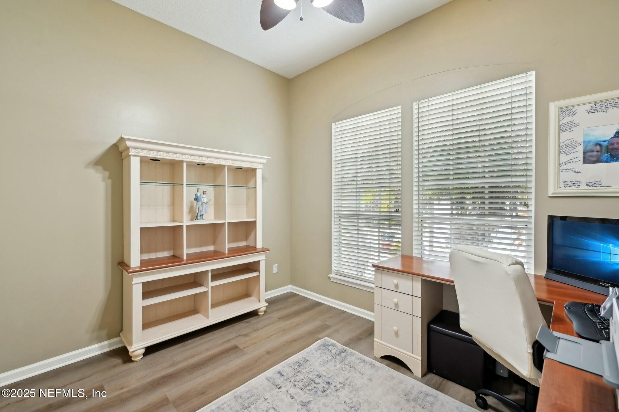 1732 Margarets Walk Road Fleming Island, FL 32003 - Photo 39 of 55 a workspace with furniture and a window