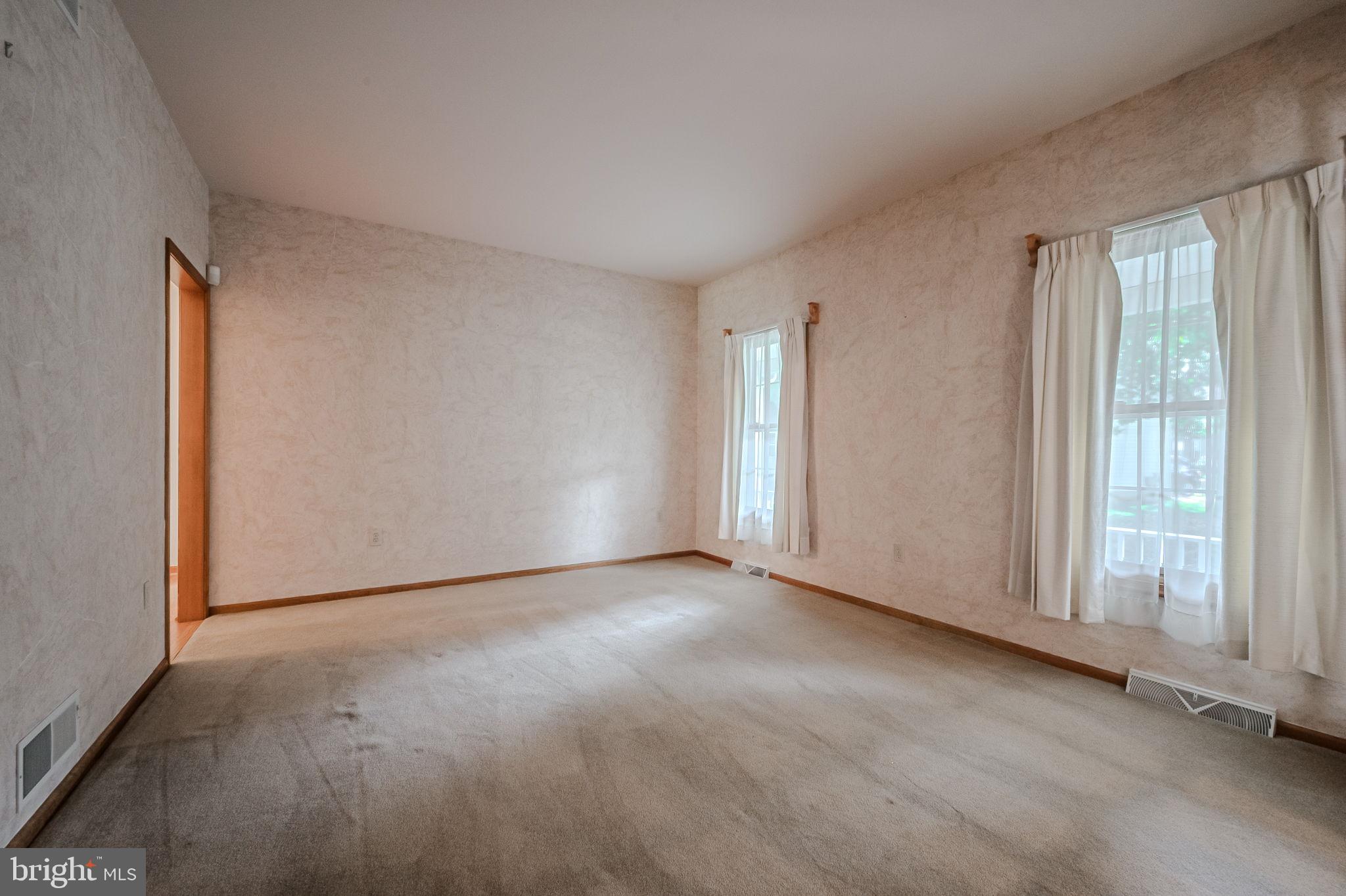 108 Michaels Lane Newark, DE 19713 - Photo 12 of 53 a view of an empty room with a window