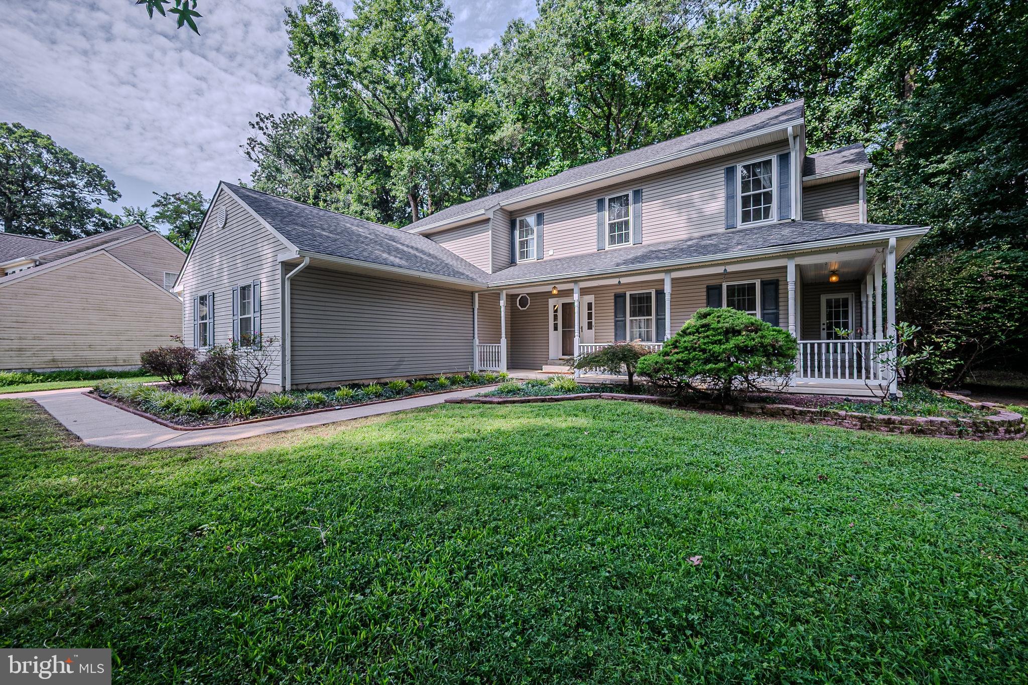 108 Michaels Lane Newark, DE 19713 - Photo 2 of 53 a front view of house with yard and green space