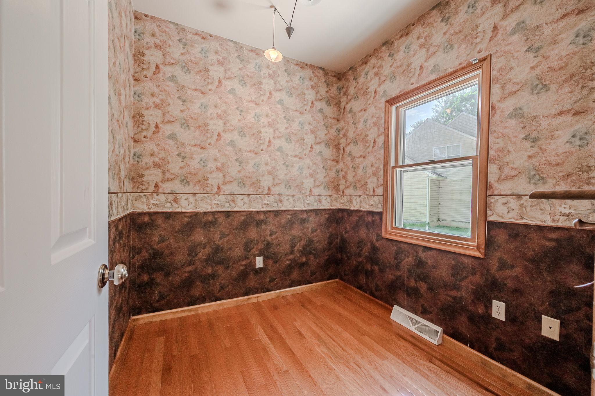 108 Michaels Lane Newark, DE 19713 - Photo 27 of 53 a view of a bedroom with wooden floor and a window