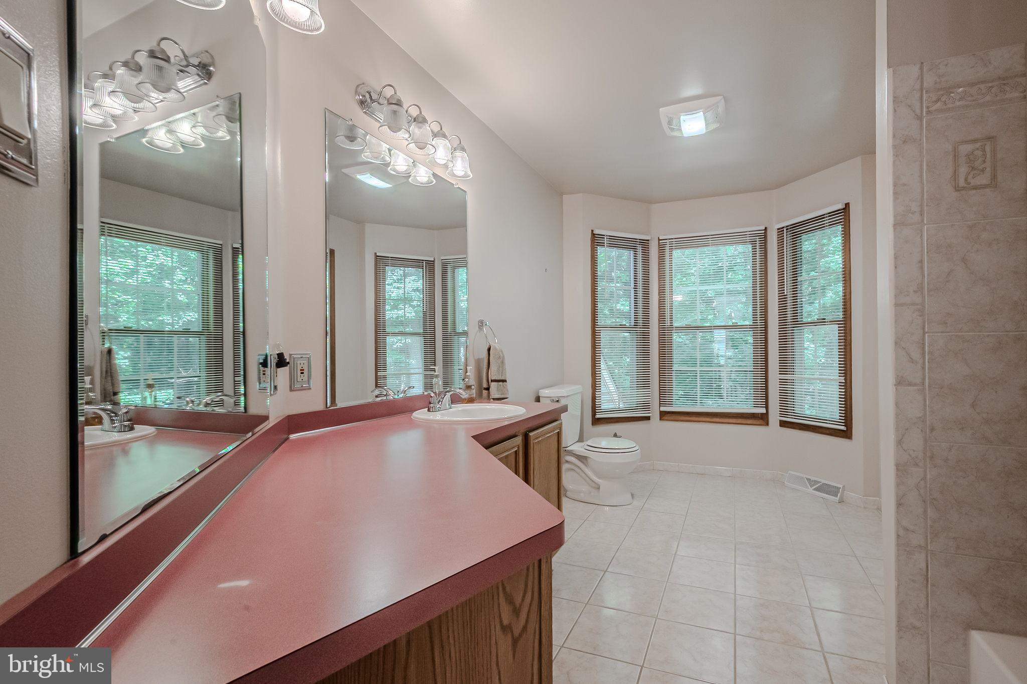 108 Michaels Lane Newark, DE 19713 - Photo 31 of 53 a view of an empty room with large windows