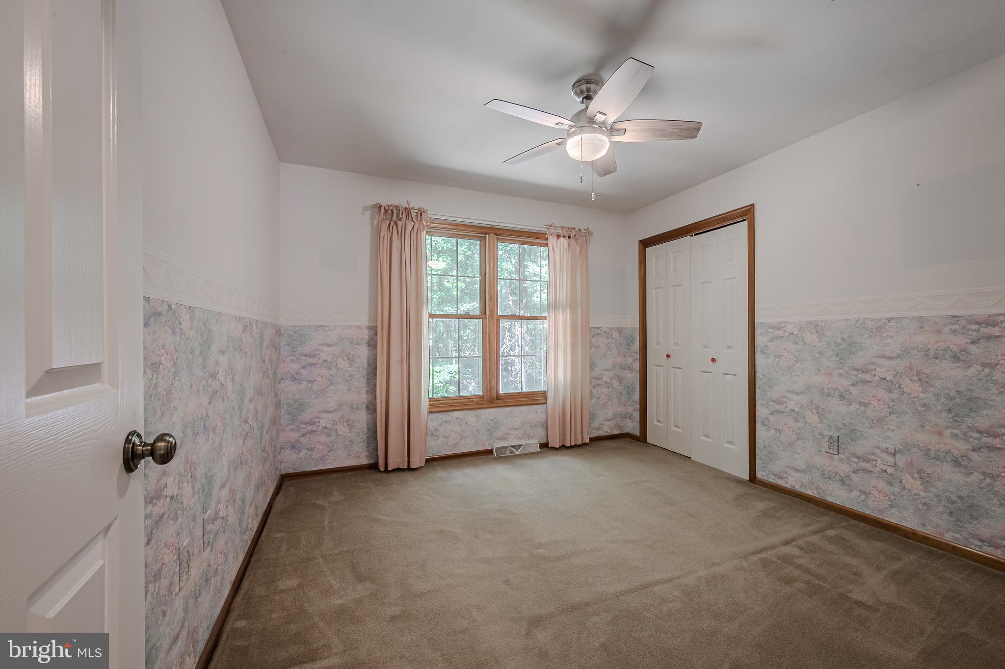 108 Michaels Lane Newark, DE 19713 - Photo 34 of 53 wooden floor in an empty room with a window