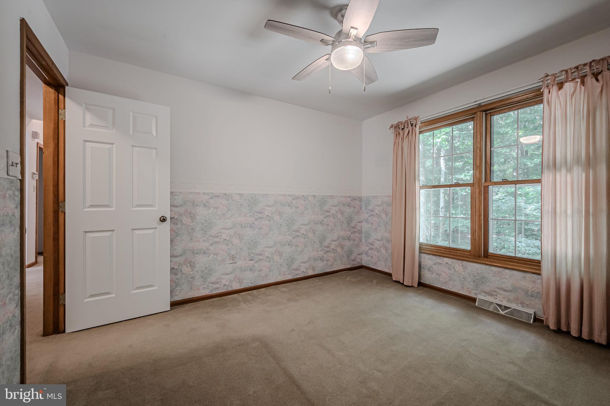 108 Michaels Lane Newark, DE 19713 - Photo 35 of 53 a view of an empty room with a window