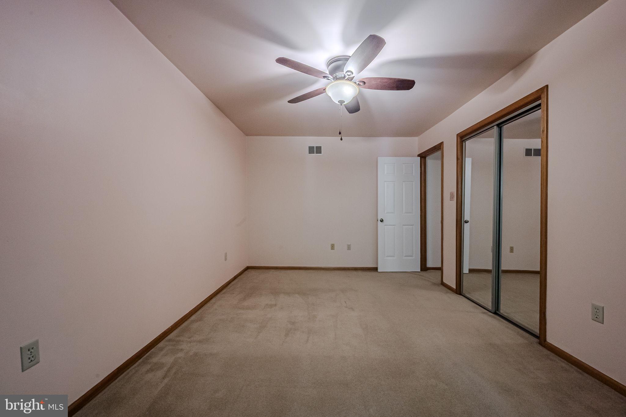 108 Michaels Lane Newark, DE 19713 - Photo 37 of 53 an empty room with chandelier fan