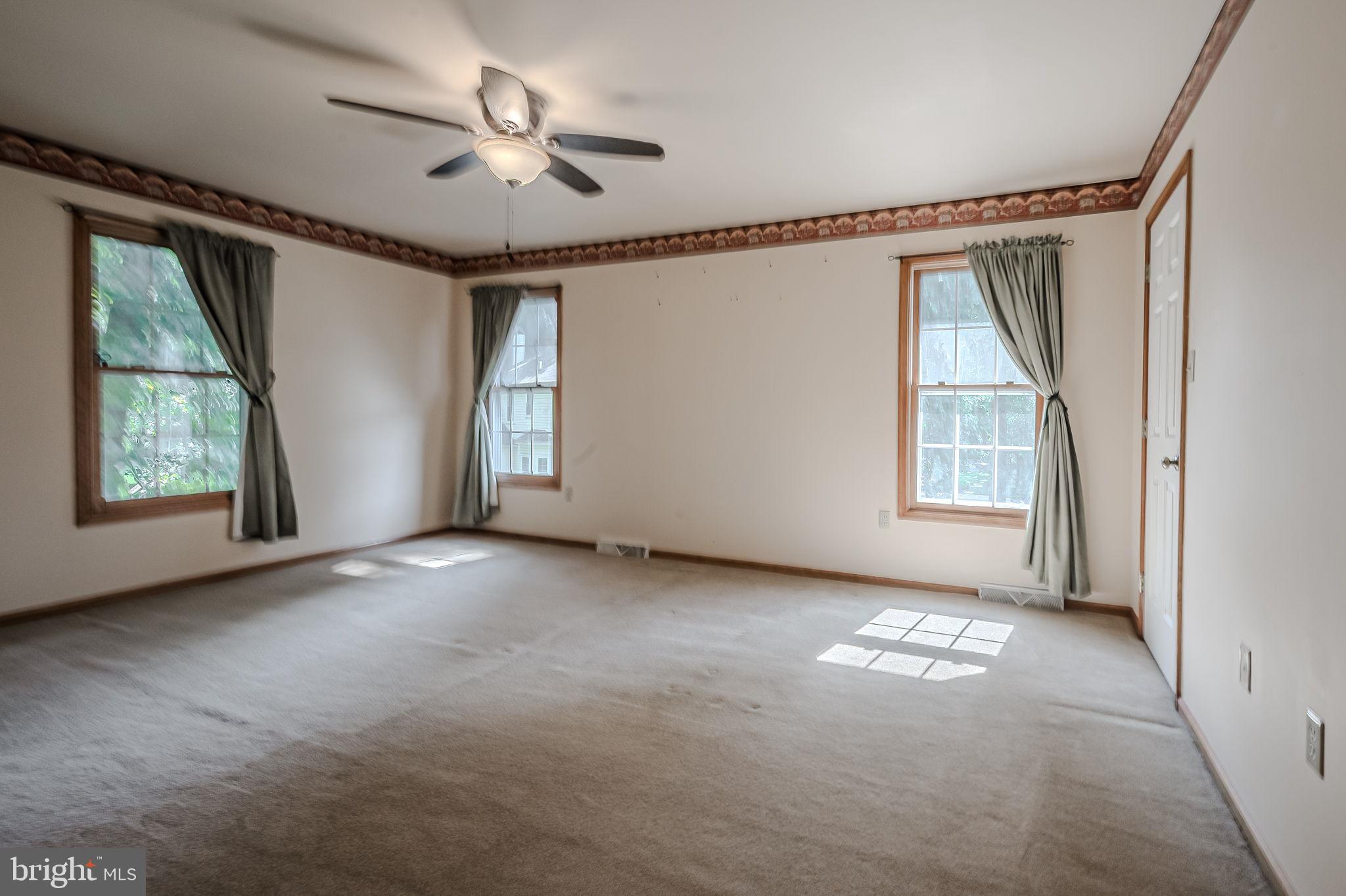 108 Michaels Lane Newark, DE 19713 - Photo 38 of 53 a view of an empty room with a window