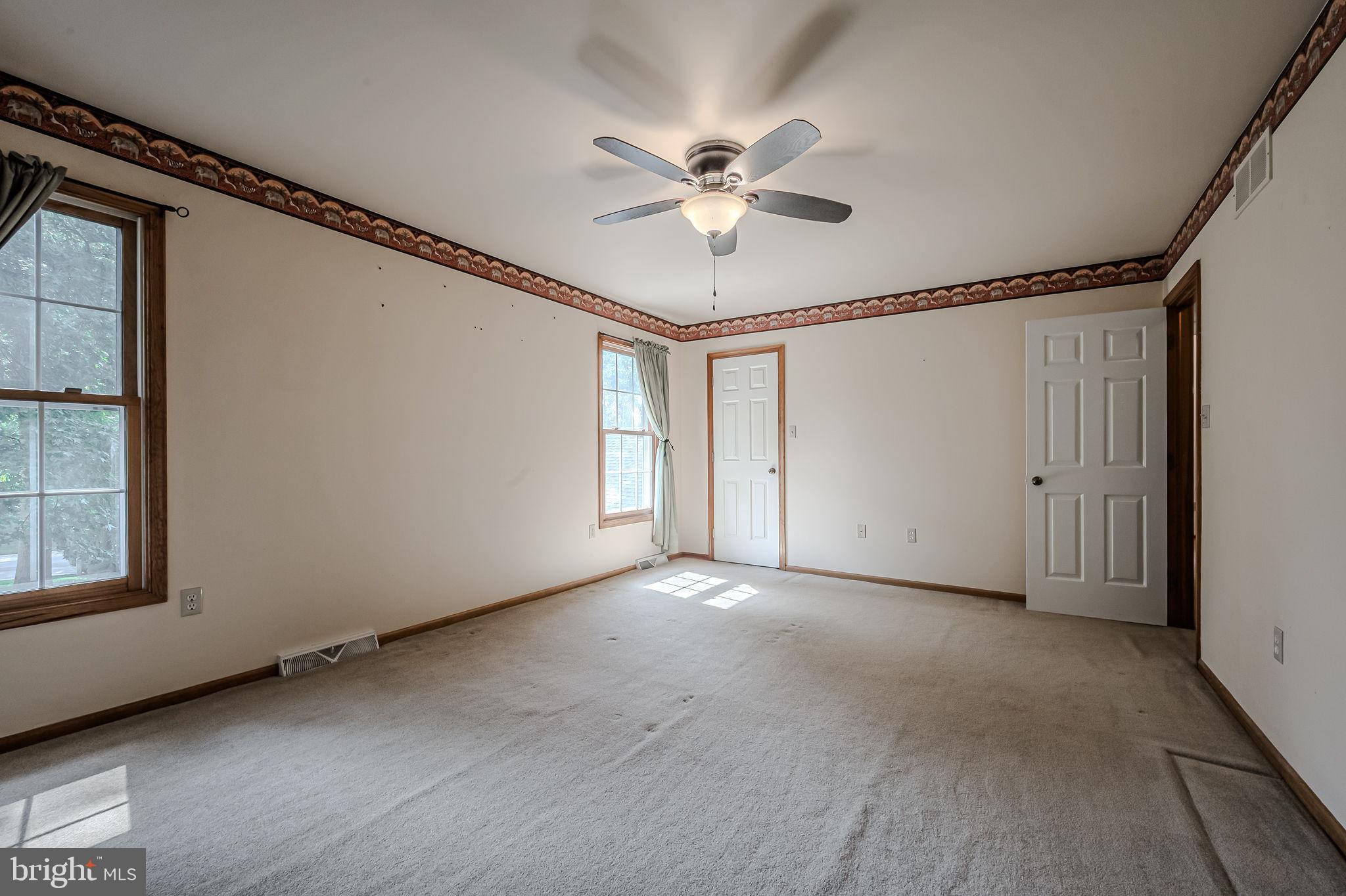 108 Michaels Lane Newark, DE 19713 - Photo 40 of 53 a view of an empty room with a window