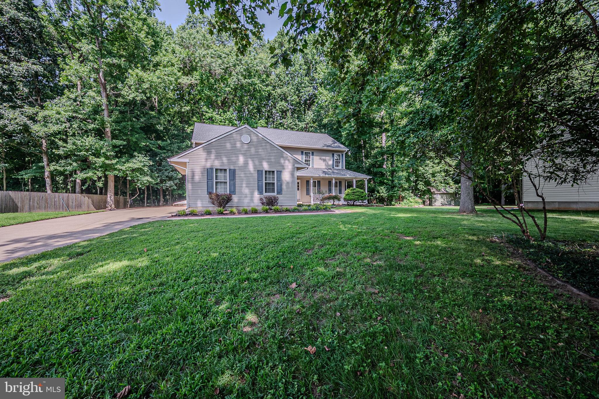 108 Michaels Lane Newark, DE 19713 - Photo 4 of 53 a front view of a house with garden