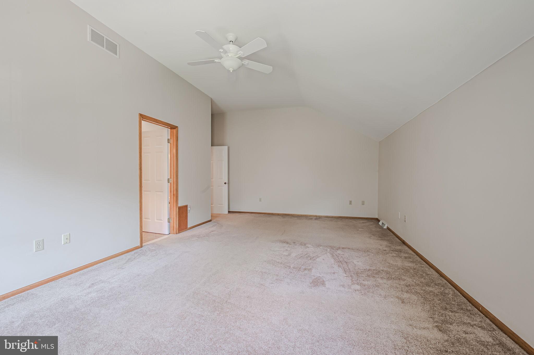 108 Michaels Lane Newark, DE 19713 - Photo 44 of 53 an empty room with a empty space and a ceiling fan