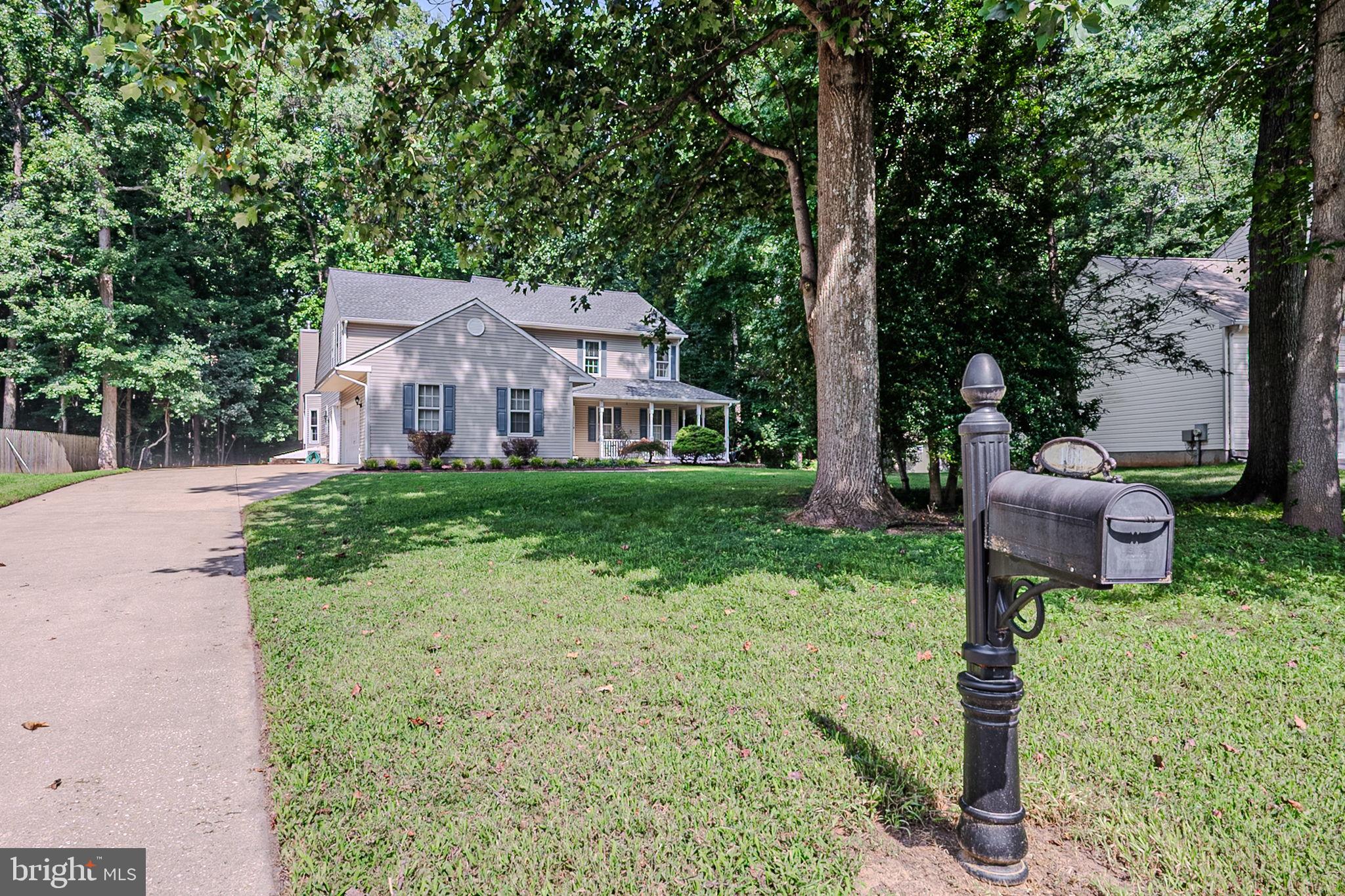 108 Michaels Lane Newark, DE 19713 - Photo 5 of 53 a front view of a house with garden