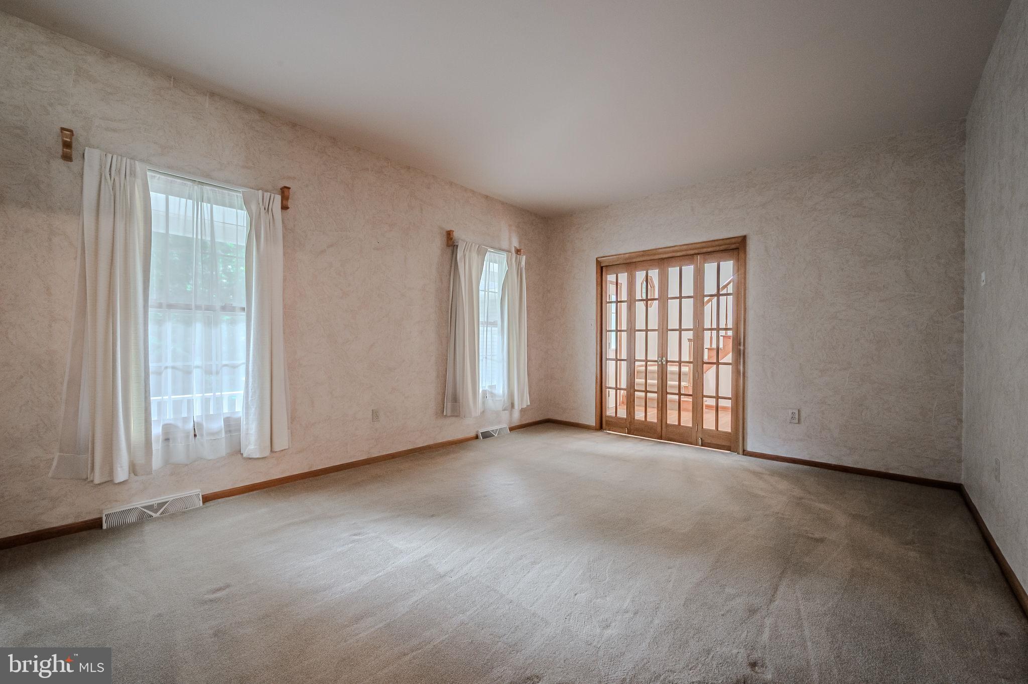 108 Michaels Lane Newark, DE 19713 - Photo 10 of 53 an empty room with windows