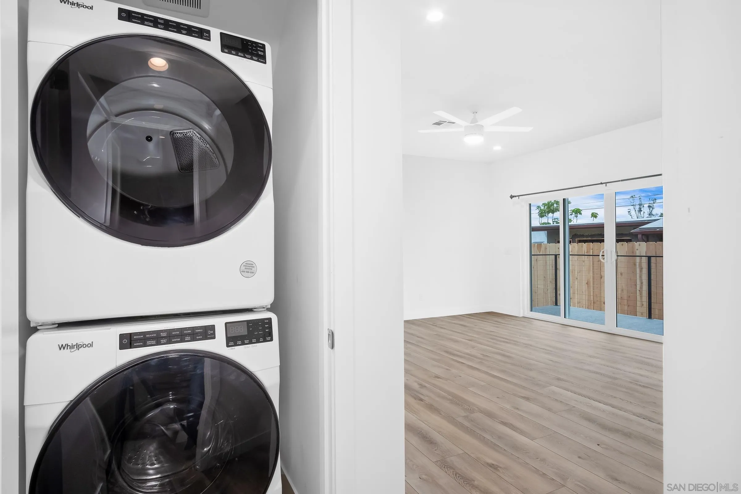 5230-32 Rincon Street San Diego, CA 92115 - Photo 14 of 29 a view of a hallway with washer and dryer