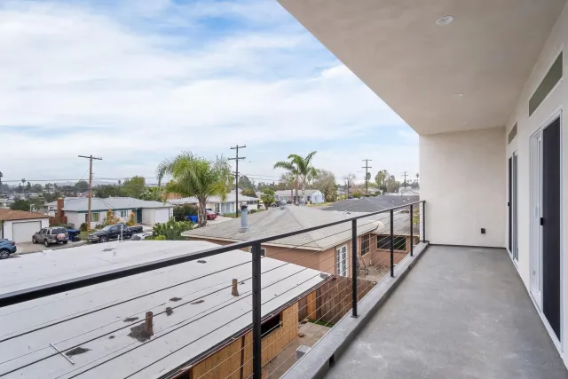 a view of balcony with furniture