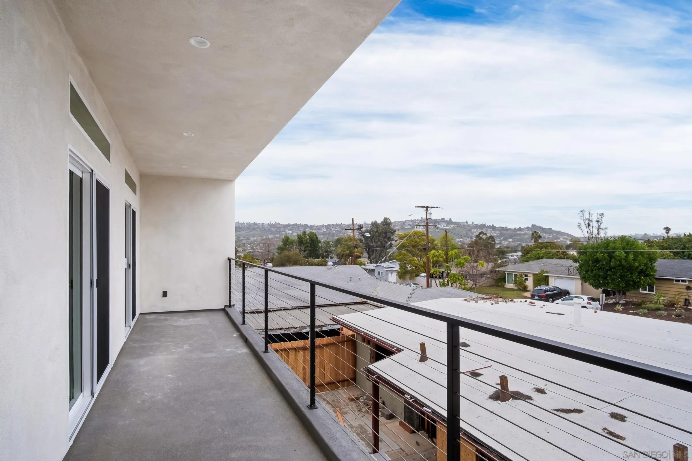 5230-32 Rincon Street San Diego, CA 92115 - Photo 22 of 29 a view of balcony with furniture