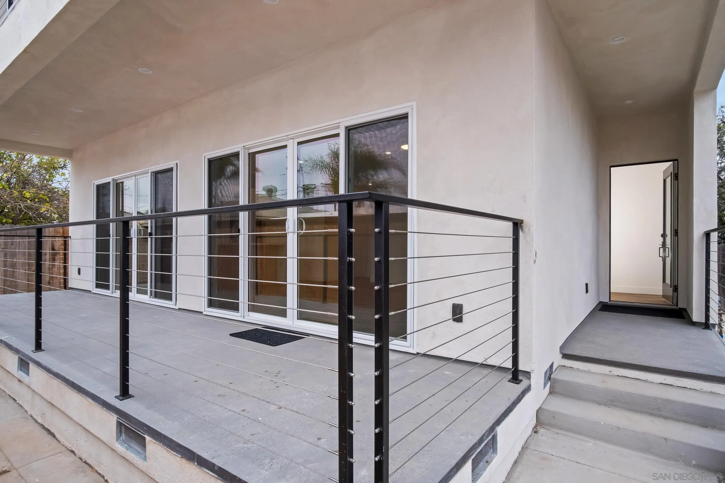 5230-32 Rincon Street San Diego, CA 92115 - Photo 3 of 29 a view of a balcony