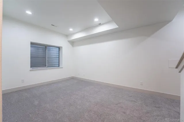 a view of a pathway both side of house