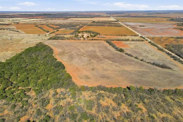 a kitchen with appliances cabinets and a counter top space