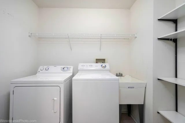 a utility room with dryer and washer