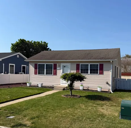 a front view of house with yard