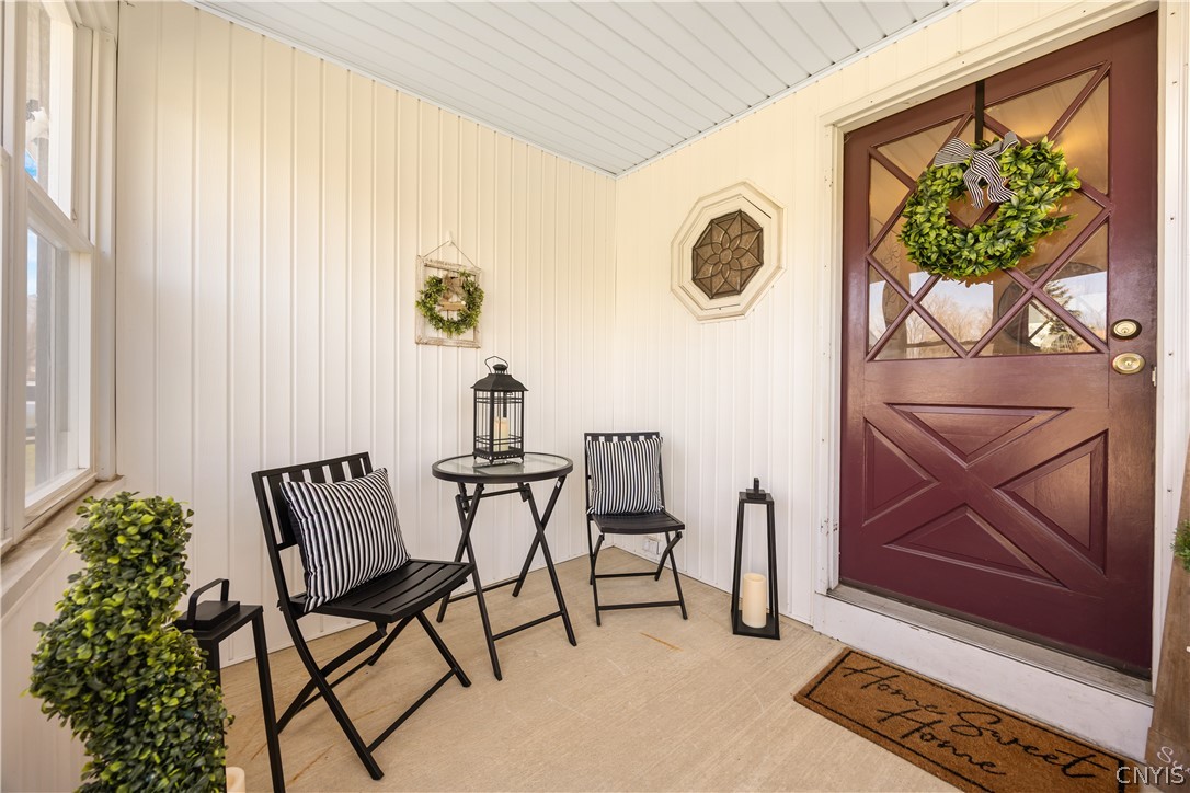 5182 Novara Lane Clay, NY 13041 - Photo 4 of 34 Enclosed Porch