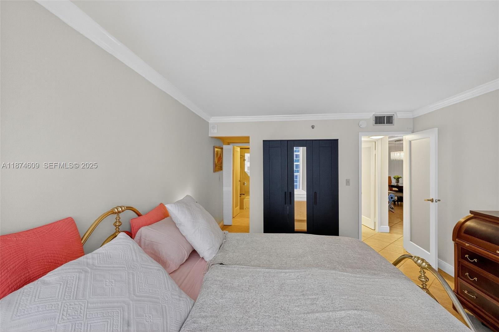 2401 Collins Avenue, Unit 1005 Miami Beach, FL 33140 - Photo 11 of 19 a bedroom with a bed and a couch