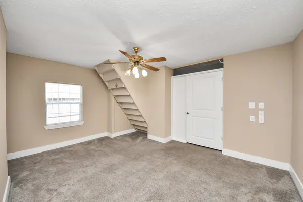 a view of an empty walk in closet