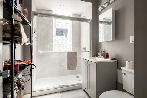 a bathroom with a bathtub sink and toilet