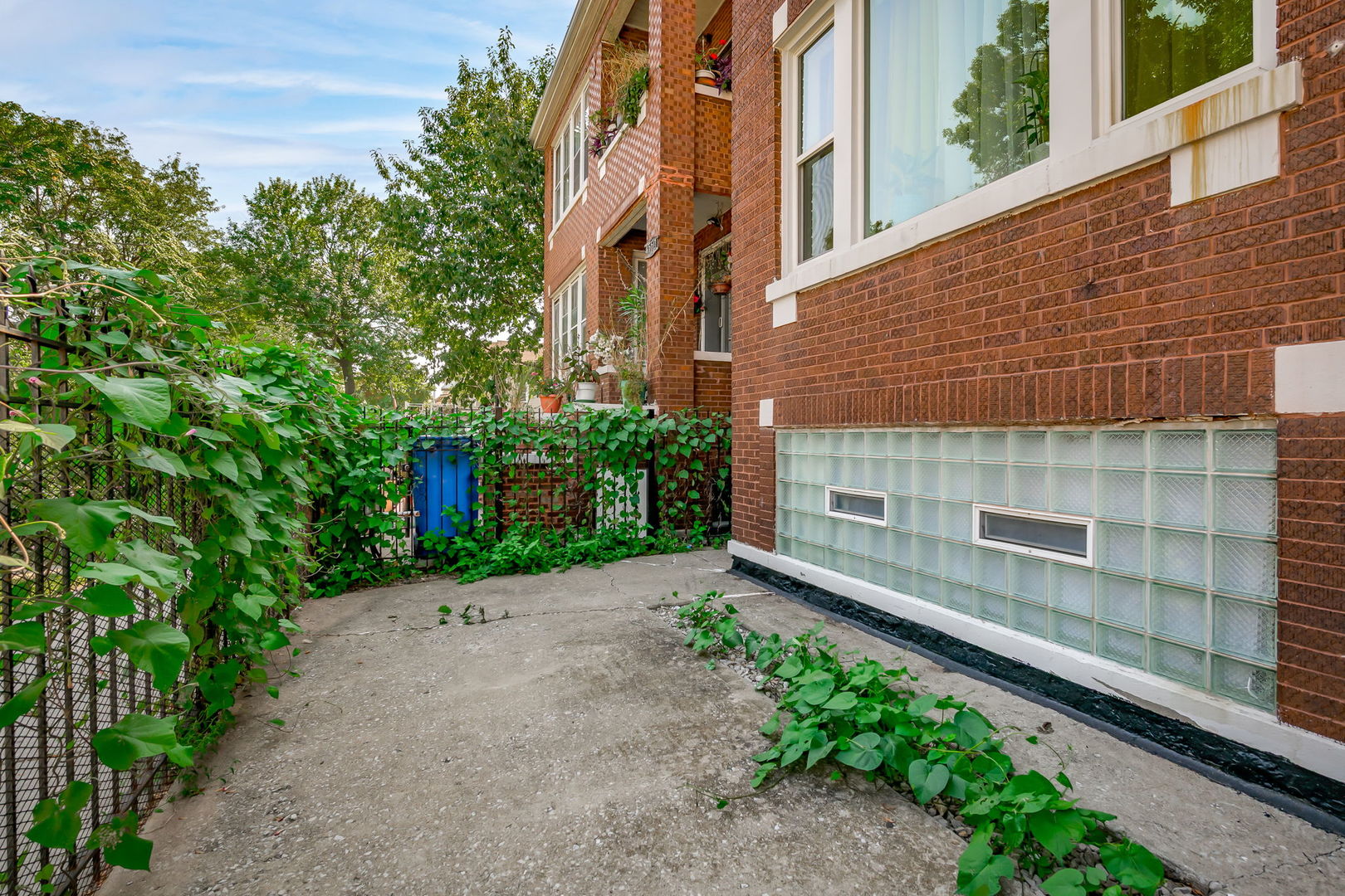 4554 South Washtenaw Avenue Chicago, IL 60632 - Photo 3 of 40 a view of a street with brick building in front of it