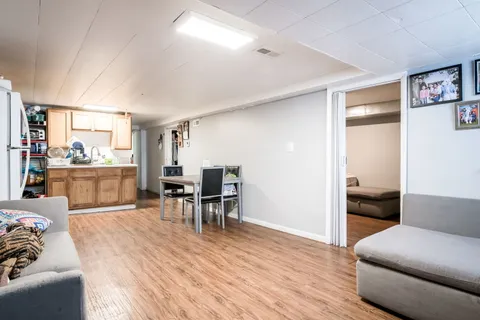 a living room with furniture and a table