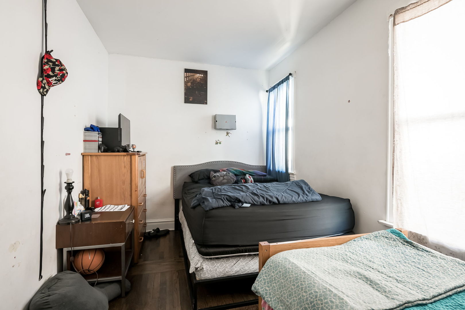 4554 South Washtenaw Avenue Chicago, IL 60632 - Photo 10 of 40 a bedroom with a bed and dresser