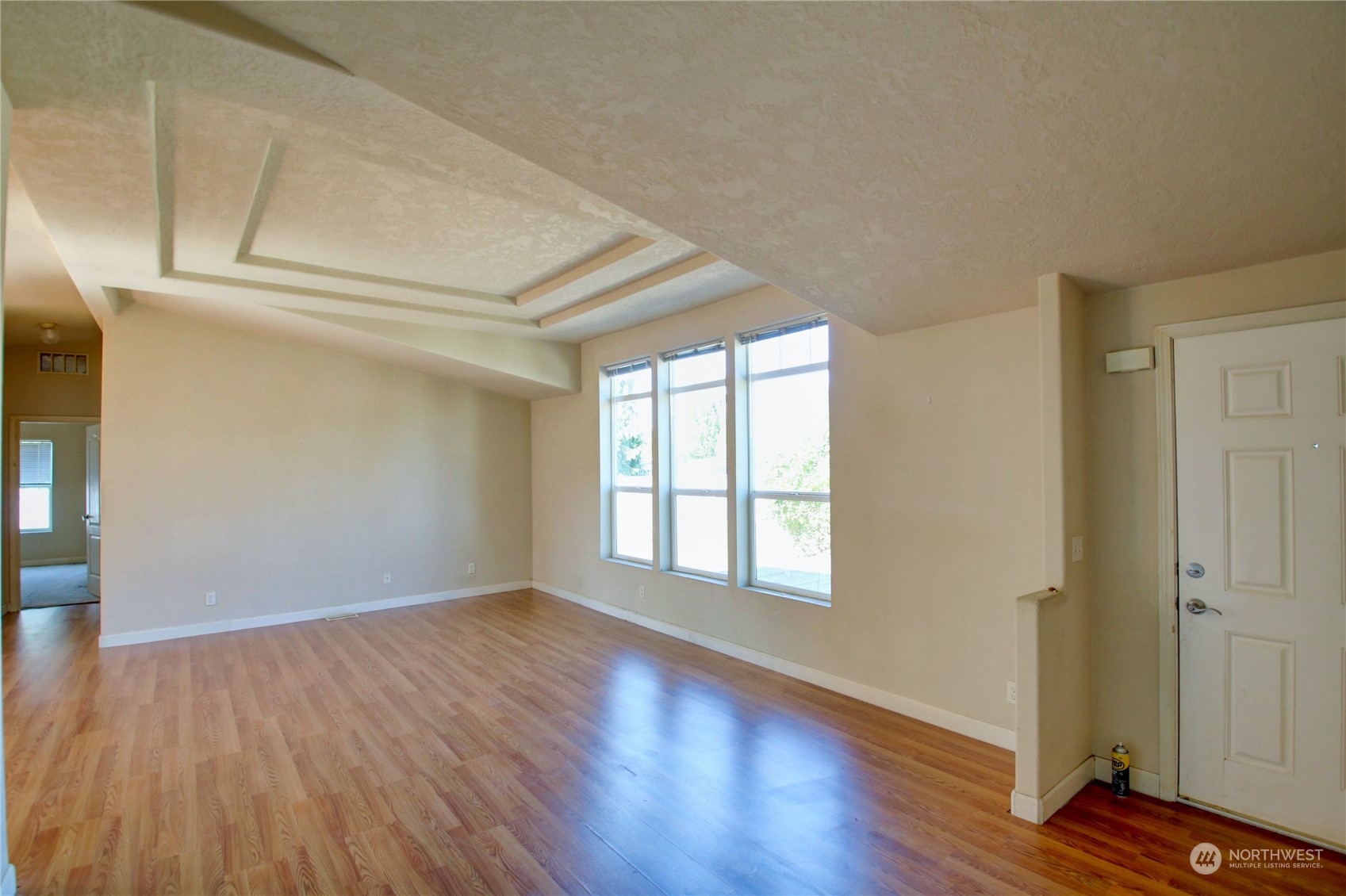 18328 State Rte 20 Burlington, WA 98233 - Photo 25 of 39 a view of an empty room with wooden floor and a window