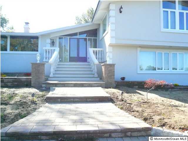 127 Stone Hill Road Colts Neck, NJ 07722 - Photo 3 of 7 a view of a entryway of the house
