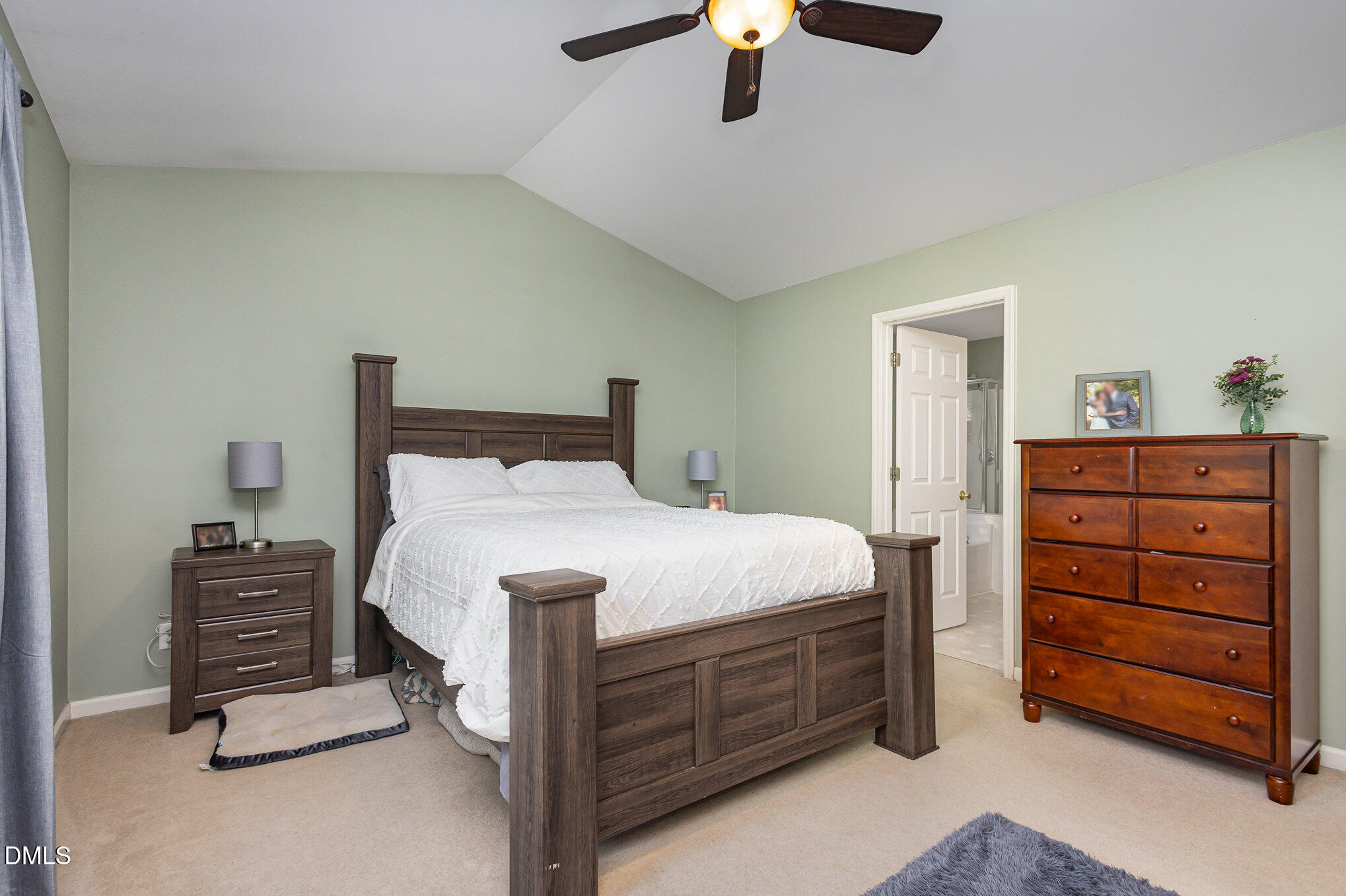 1004 Chancellors Ridge Drive Durham, NC 27713 - Photo 14 of 32 a bedroom with a bed and a dresser